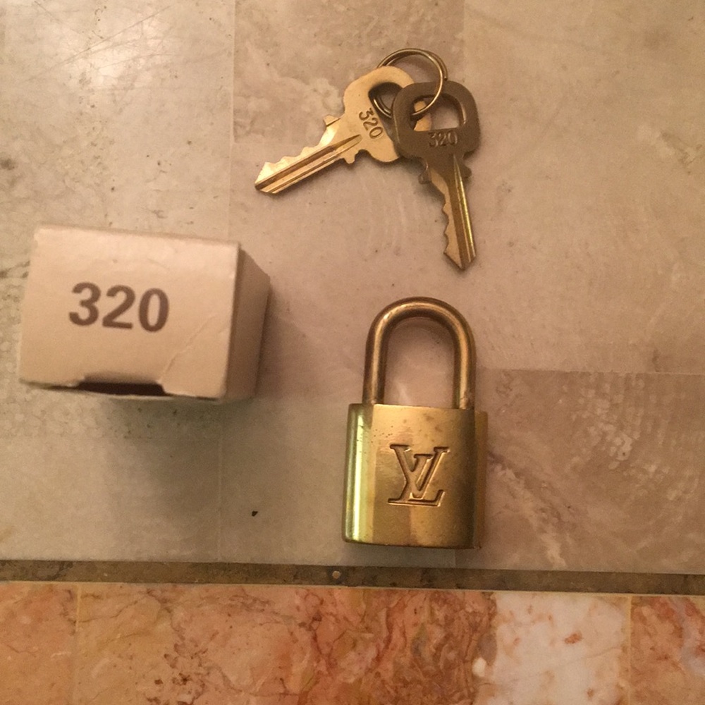 Authentic Louis Vuitton lock and keys